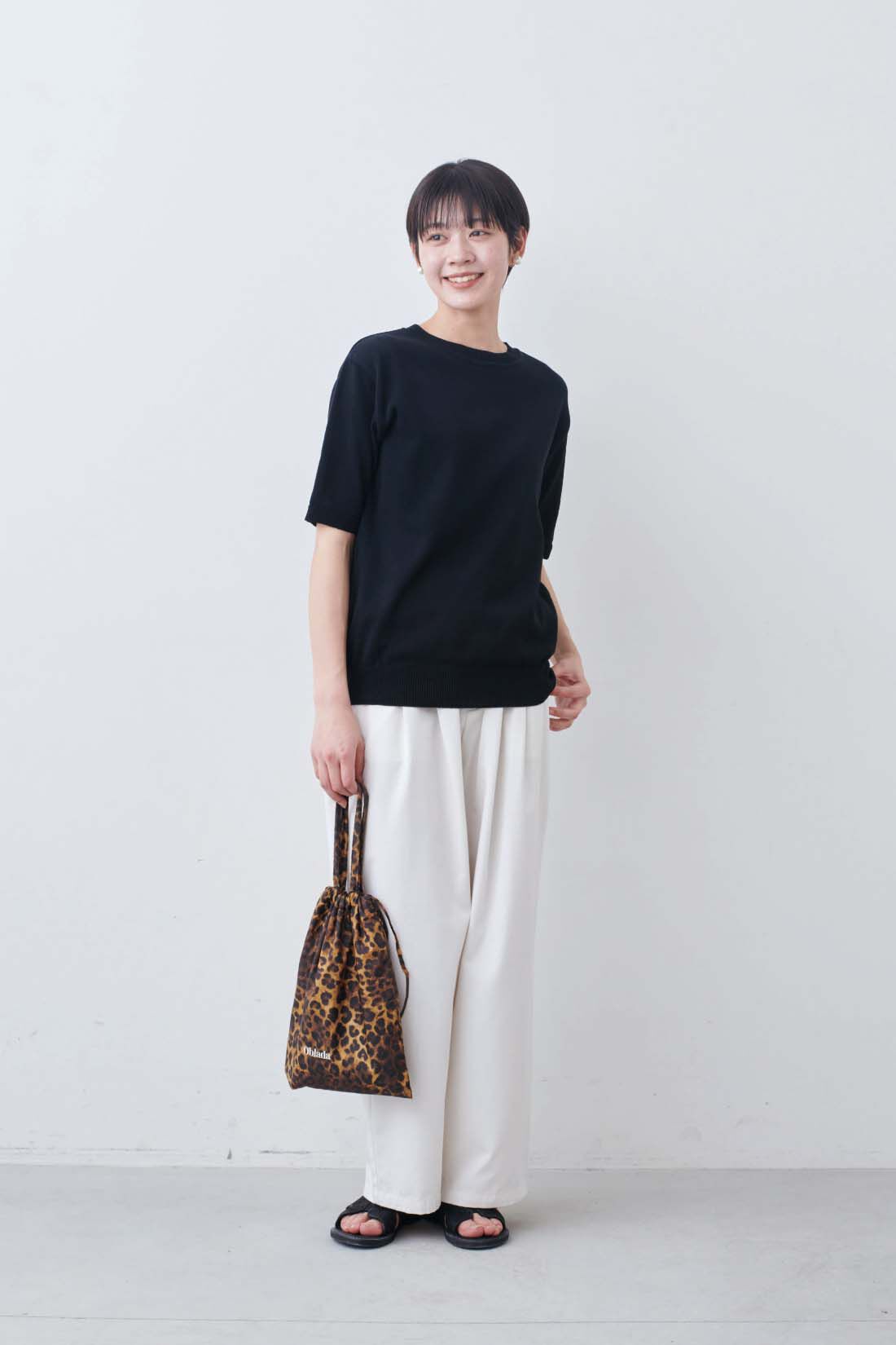 THREE FIFTY STANDARD|オーガニックコットンとリサイクルポリエステルのニットトップス〈ブラック〉のコーディネート