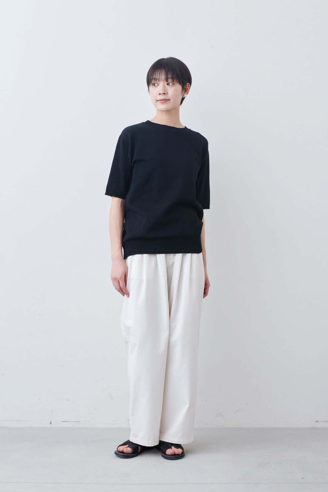 THREE FIFTY STANDARD|オーガニックコットンとリサイクルポリエステルのニットトップス〈ブラック〉のコーディネート