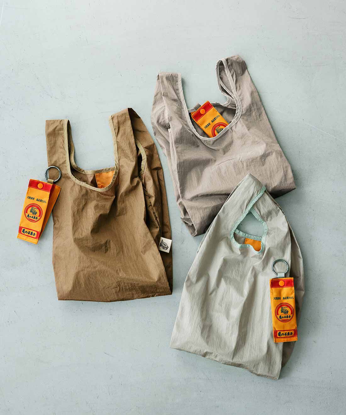 L'AMIPLUS|亀の子束子&times;ラミプリュス 亀の子束子パッケージにそっくりなポーチ付き撥水（はっすい）まち広エコバッグの会