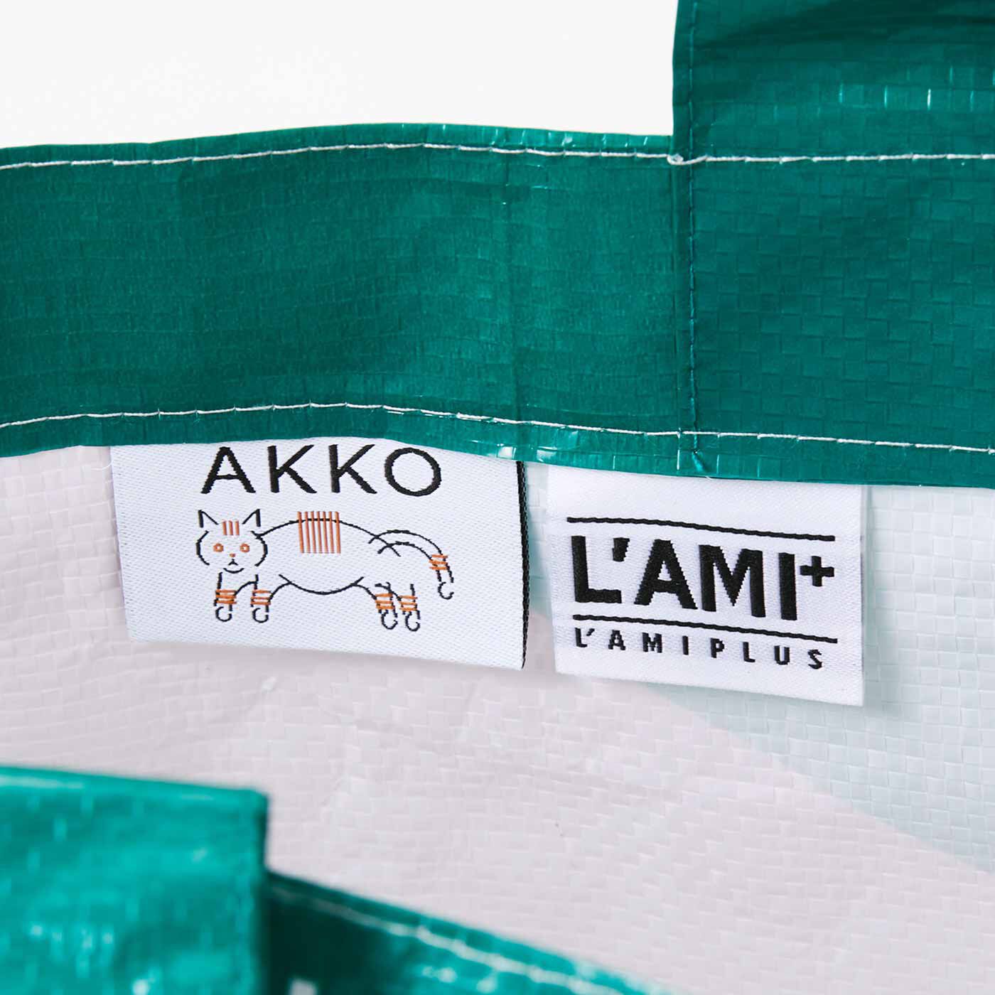 フェリシモギフトショップ|菊池 亜希子さん&times;ラミプリュス　記憶の中の色と好きをデザインした　アートピースのようなビッグバッグ|コラボタグのアイコンは、菊池さんの愛猫をモデルにした田部井さんのグラフィック。